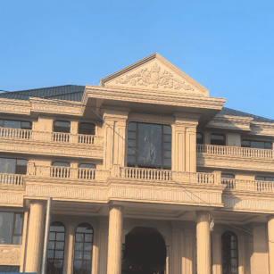 景德镇黄金麻别墅外墙干挂石材效果示例